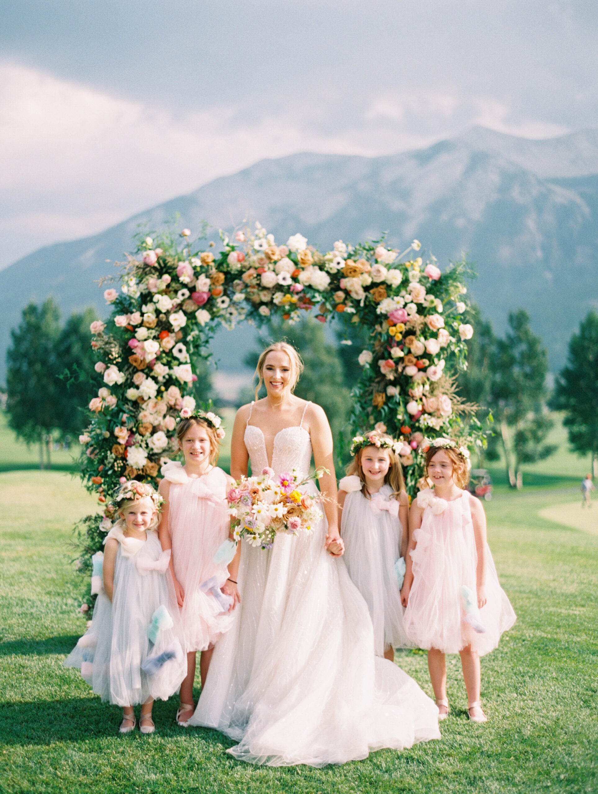 Bride with flower girls