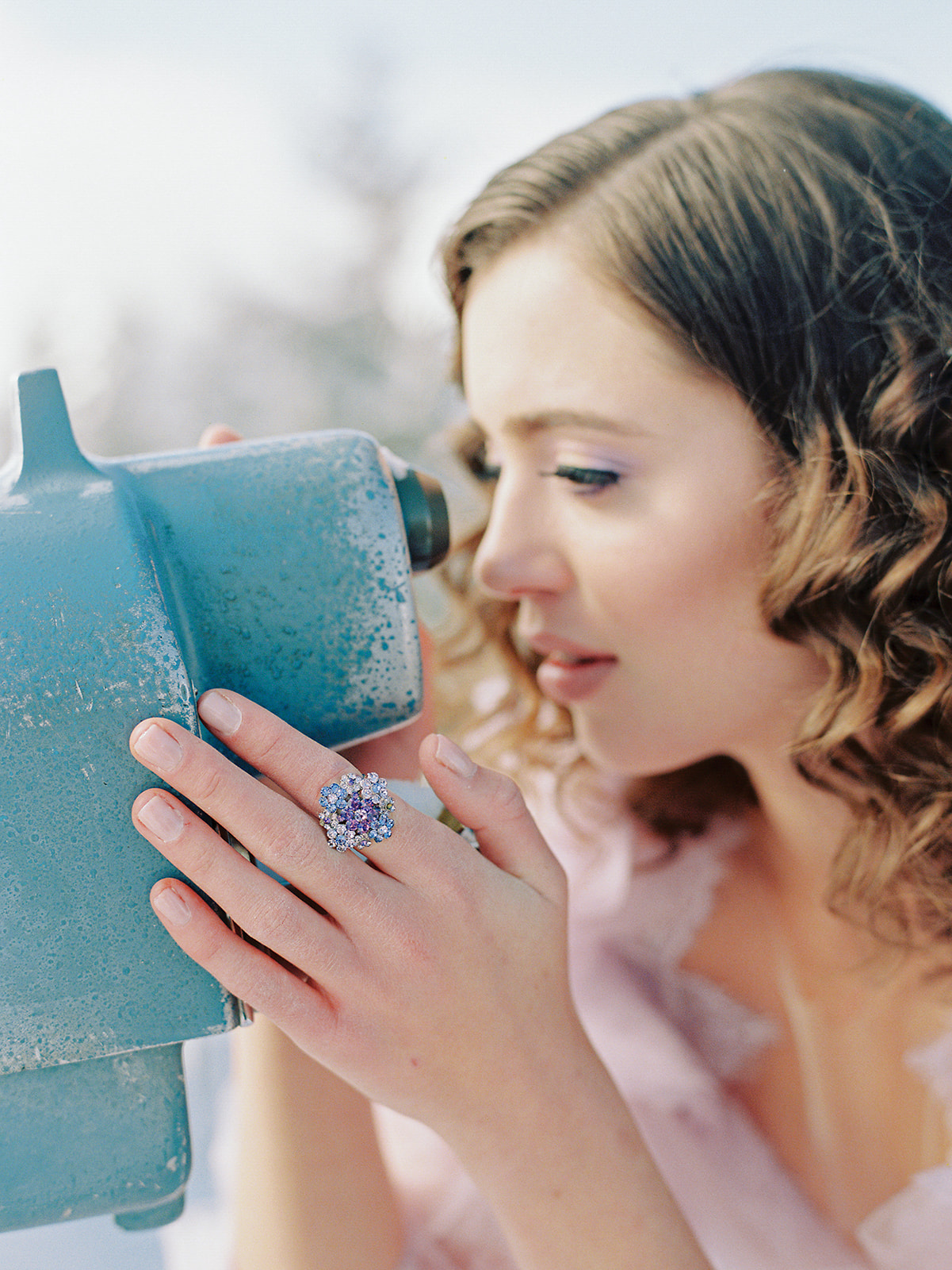 Woman looking through telescope